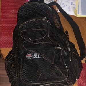 Mesh backpack. Used plentifully.